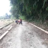 Pemdes Munjul Perbaiki Jalan Cipalawad-Tanjung Jaya