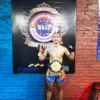 SABUK EMAS: Praka Abdul Munir menunjukkan sabuk emas kelas 63,5 kg Amatir Profesional yang berhasil diraihnya dalam kejuaraan Kick Boxing Bali Open Championship 2022 di Angel Padang MMA Padangsumbu Kelod, Denpasar Barat, Bali.  Dok Batalyon Armed 9 Pasopati Kostrad