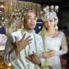 Ikmal Tobing dan Indah Lolita. (Foto: Abdul Rahman/JawaPos.com)