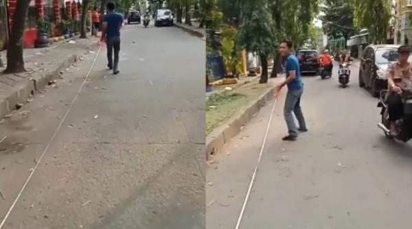 Viral! Aksi Nekat Bapak-Bapak di Tanggerang Mengukur Jarak Menggunakan Meteran