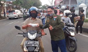 DPW KPM Brigez Kota Banjar Bersama IWABI Berbagi Takjil dan Masker