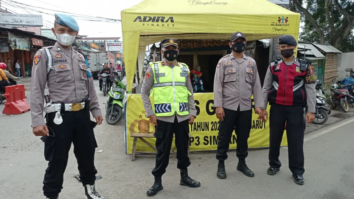 Pastikan Arus Mudik Lancar, Polsek Bayongbong Siagakan Personel di Pos Gatur