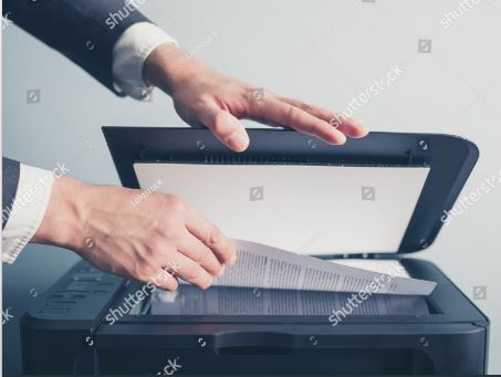 scanner (https://www.shutterstock.com/image-photo/hands-young-businessman-placing-document-on-264387707)