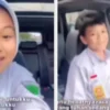 Sepasang Anak Berseragam SMP Pacaran Sambil Nyetir Mobil Sendiri