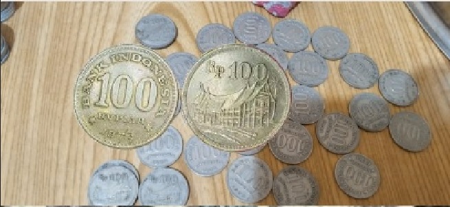 Koin kuno 100 rupiah rumah gadang tahun 1973