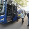 Bey Machmudin Naik Bus