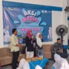 Siswi SMK IT Muhajirin saat sedang mengikuti kegiatan aksi bergizi yang dilakukan oleh Dinas Kesehatan Kabupat