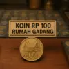 Koin Rp 100 Bergambar Rumah Gadang Dari Alat Tukar Jadi Koleksi Bernilai ( AI )