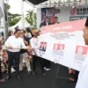 Capres-RI-Anies-Baswedan-melakukan-simulasi-pencoblosan-paslon-01-saat-kampanye-akbar-di-Samarinda-Kaltim.webp