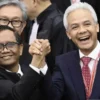 Calon presiden dan calon wakil presiden nomor urut 3 Ganjar Pranowo (kanan) dan Mahfud MD (kiri)