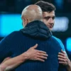 Pep Guardiola dan Abdukodir Khusanov.