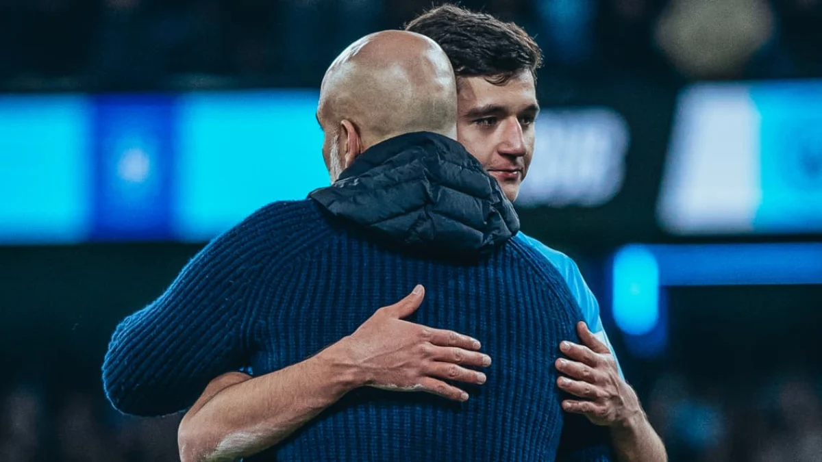 Pep Guardiola dan Abdukodir Khusanov.