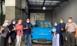 Rajin Pakai BRImo, Nasabah BRI Ini Dapat Hadiah Mobil Listrik Premium