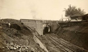 New railway with viaduct above it Tropenmuseum, part of the National Museum of World Cultures