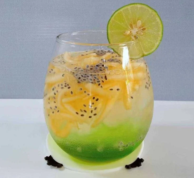 1. Campurkan air kelapa dengan melon 2. Bisa buat dua versi. Peras air jeruk dan sirup gula terlebih dahulu. Keduanya dengan sirup Cocopandan. 3. Untuk versi pertama, campur air melon dengan perasan air jeruk dan simple syrup. 4. Untuk versi kedua, tuang sirup pandan kelapa di dasar gelas. Isi dengan air dan bubur melon. Jika suka, bisa ditambahkan perasan jeruk nipis. 5. Siapkan es batu secukupnya. Biaya tambahan 