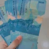 arti mimpi di kasih uang