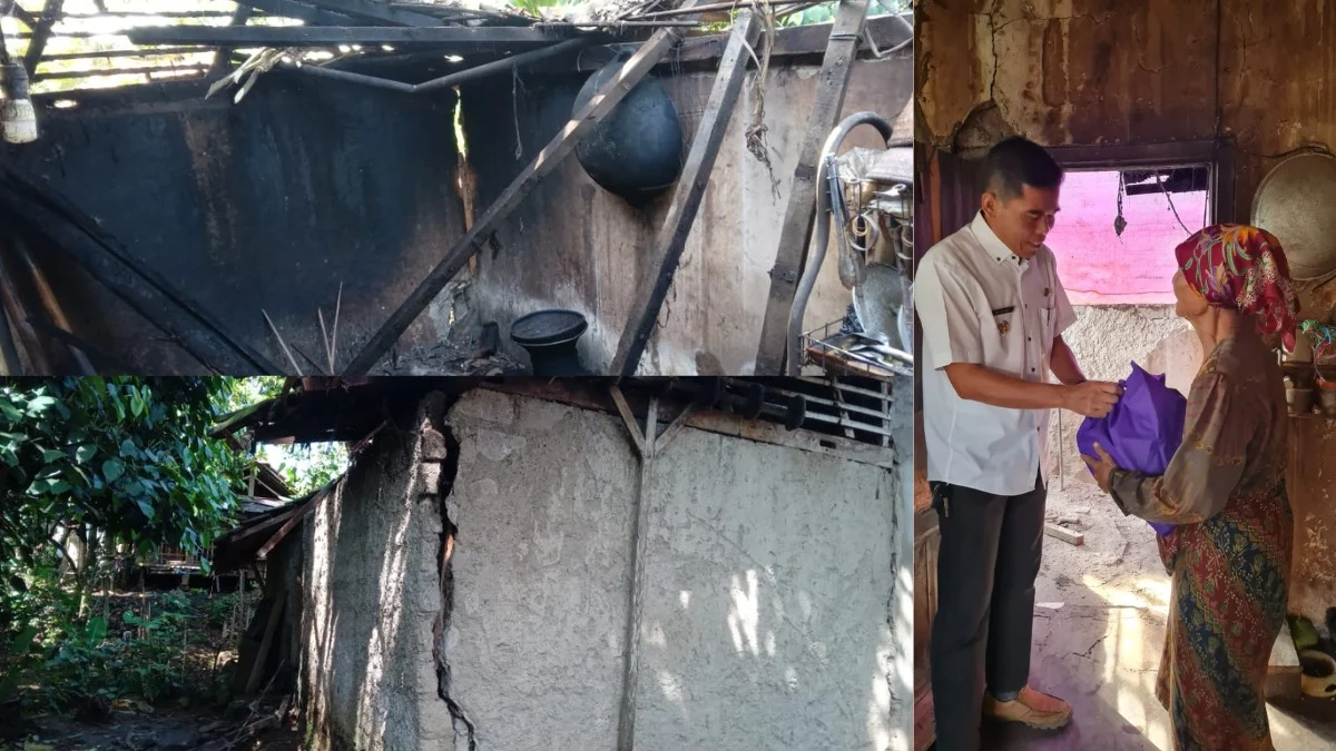 ISTIMEWA BERIKAN BANTUAN: Camat Tanjungmedar Suhandi saat memberikan bantuan kepada korban yang dapur rumahnya