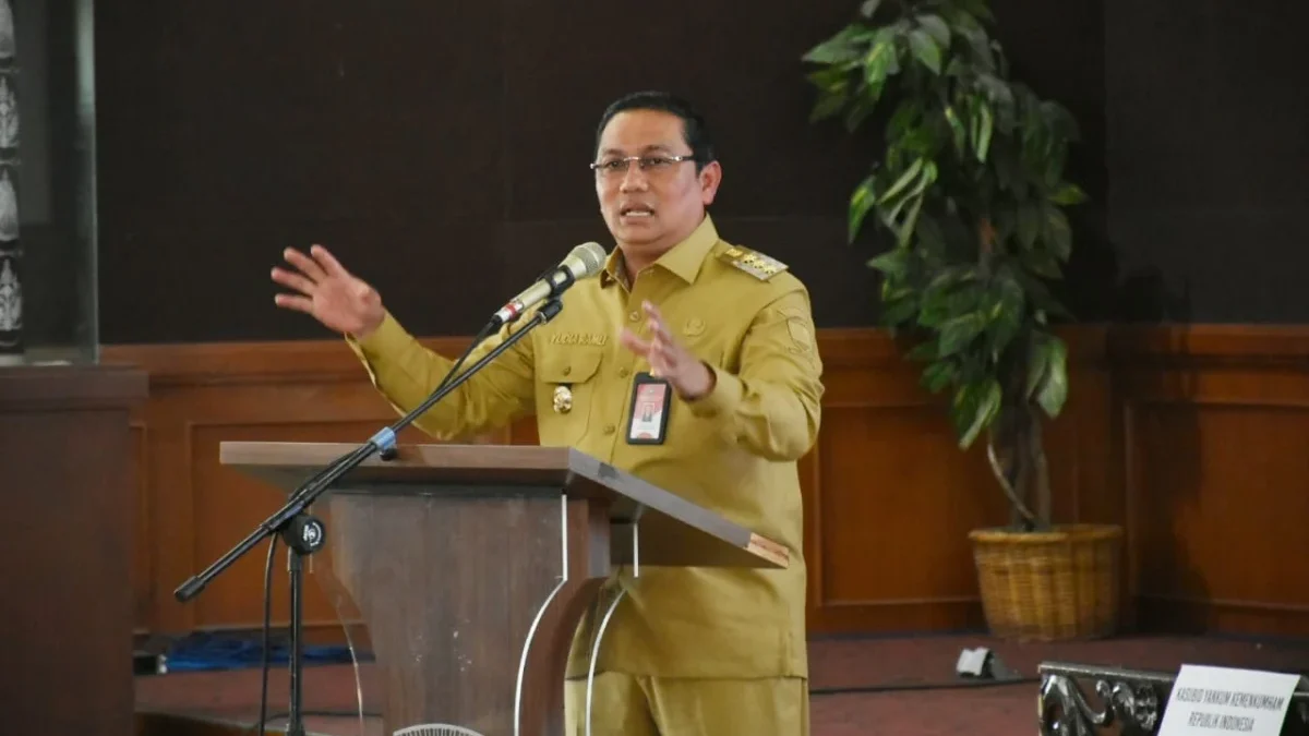 PIDATO: Pj Bupati Sumedang Yudia Ramli saat pembukaan Kick Off pendampingan UMKM Naik Kelas di Aula Tampomas,