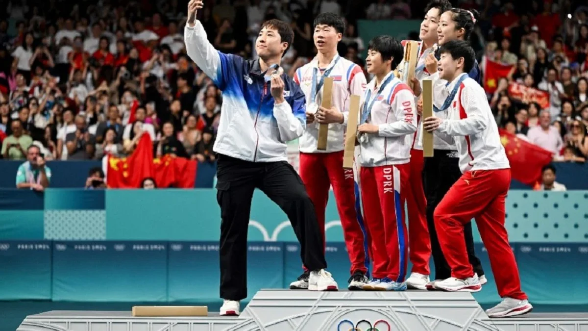 Atlet korea mendapatkan hukuman setelah foto selfie dengan atlet korea selatan dalam olimpiade paris 2024.