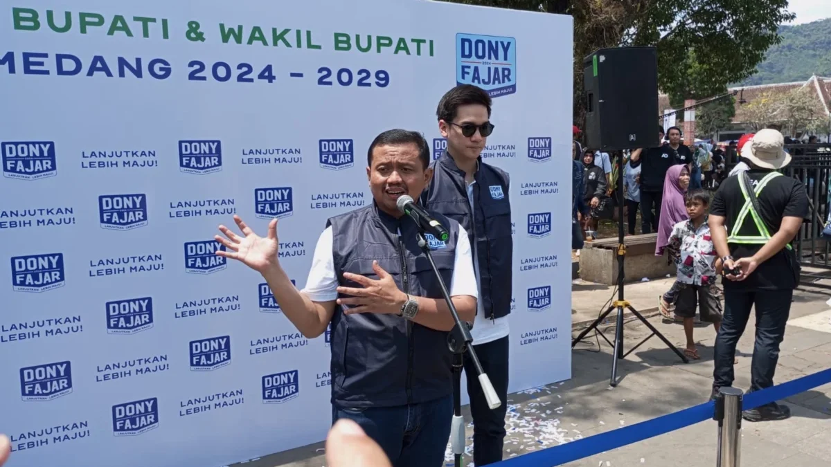 BERJANJI: Pasangan Calon Bupati dan Wakil Bupati Sumedang Dony Ahmad Munir dan Fajar Aldila pada saat Pesta Ra