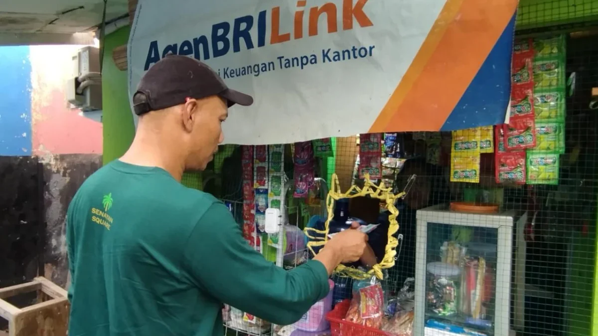 Pahlawan Inklusi Keuangan, AgenBRILink di Tengah Kebun Kelapa Sawit Berhasil Dekatkan LayananPerbankan