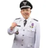 Kepala Desa Haurngombong, Dadang.
