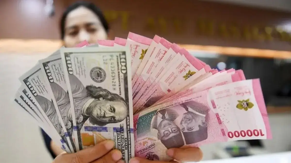 Tolak Pembayaran Tunai Rupiah Bisa Dipidana, Banggar DPR Ingatkan Ancaman Penjara hingga Denda Rp200 Juta mata uang Rupiah dan Dolar AS