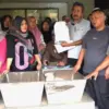 Ketua Ikatan Warga Pasar Cimalaka (IKWAPACI), Dian Kusdian