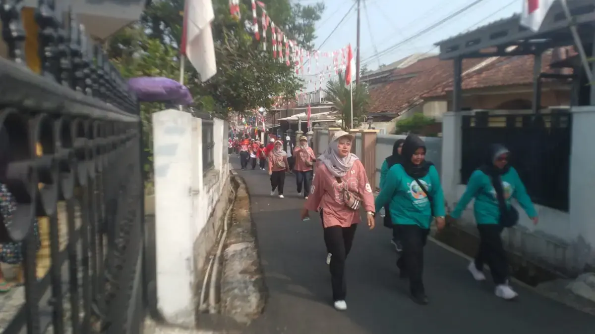 Gerak Jalan Pererat Kebersamaan Gerak Jalan Pererat Kebersamaan